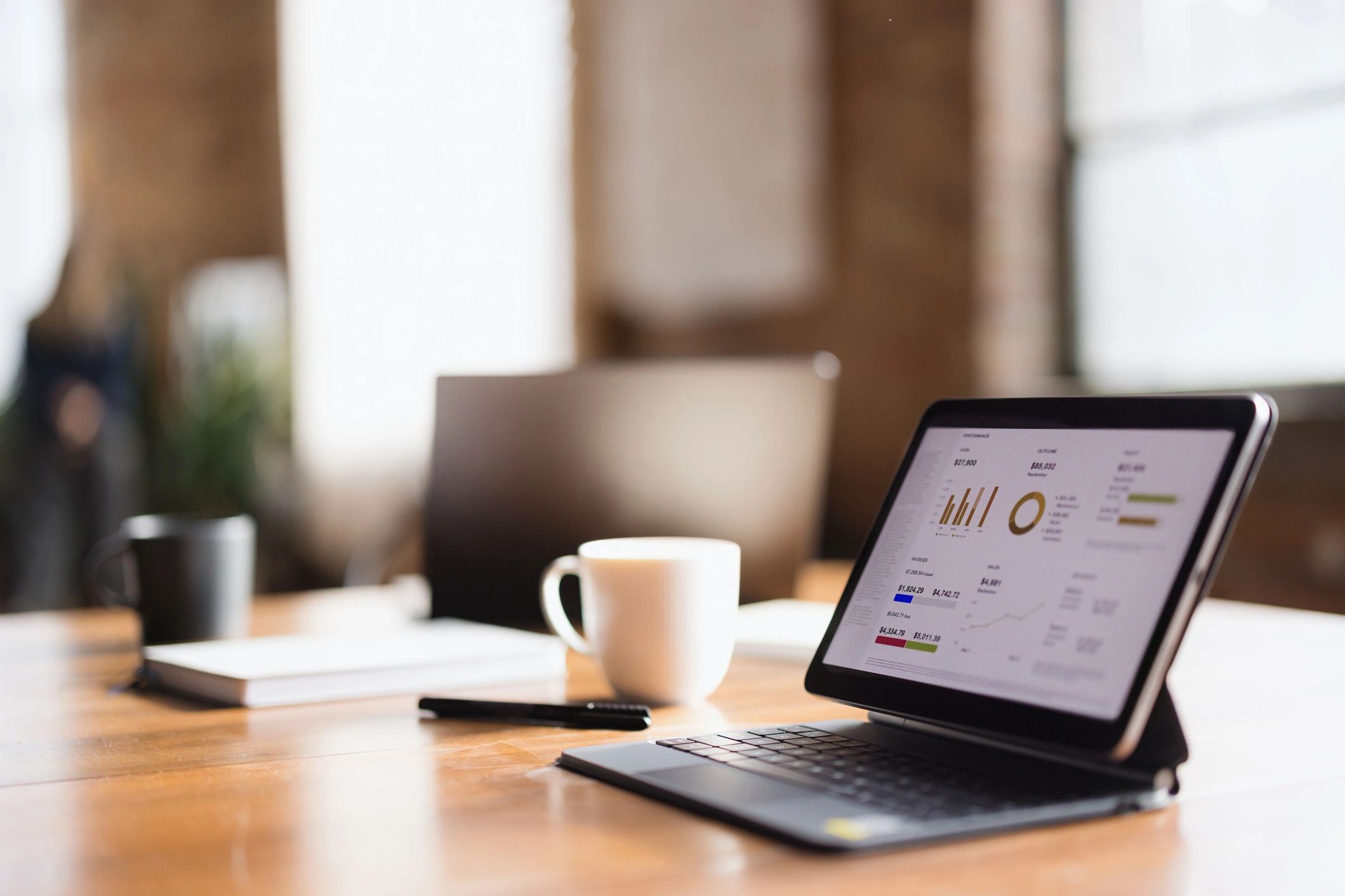 Business planning chart on a tablet at an office desk